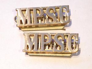 Military Provost Staff Corps Shoulder Titles.