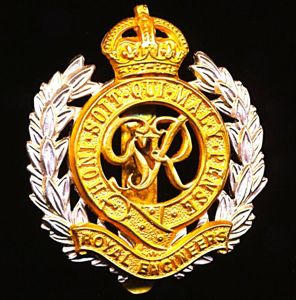 Royal Engineers. GVI King's Crown bi-metal die-struck cap badge with …