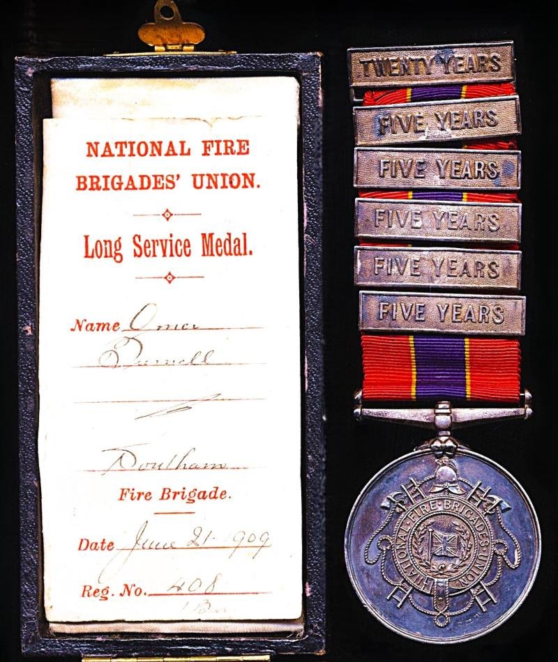 National Fire Brigade's Union Long Service Medal. Silver (H/M) issue with integral 'Twenty Years' top clasp and 5 x 'Five Years' clasps. Named (O. Burnell.) & numbered (408) — image 2