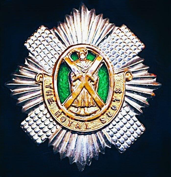 Royal Scots: Cap Badge. 2nd Battalion. Bi-metal with green cloth backing insert, as worn circa 1899-1948