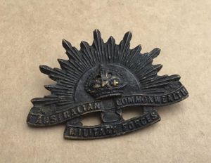 WW1 Sand Cast Rising Sun Hat Badge