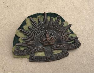 1930-42 Militia Period Rising Sun Hat Badge