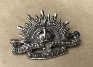 1930-42 White Metal Rising Sun Hat Badge