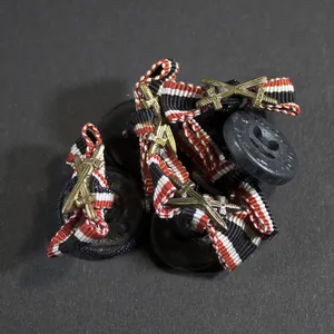 Button (bow) – War merit cross with swords