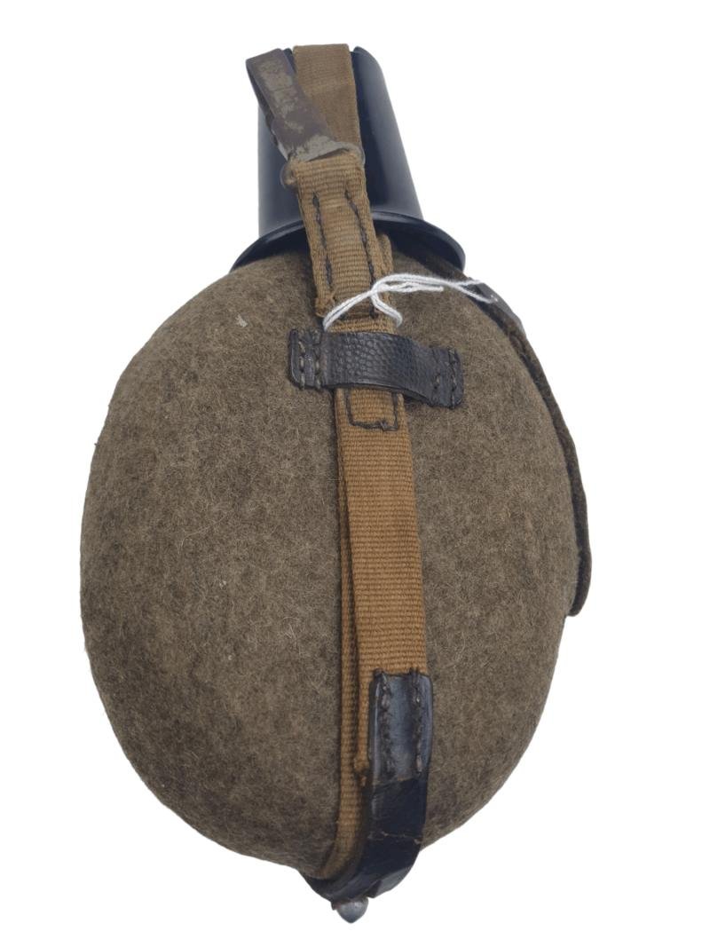 in used condition Wehrmacht M31 canteen with Bakelite cup — image 2