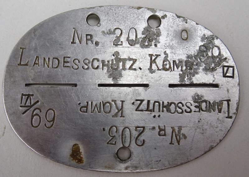 a Erkennungsmarke Landesschütz. Komp. 69/VI No.203 — image 2