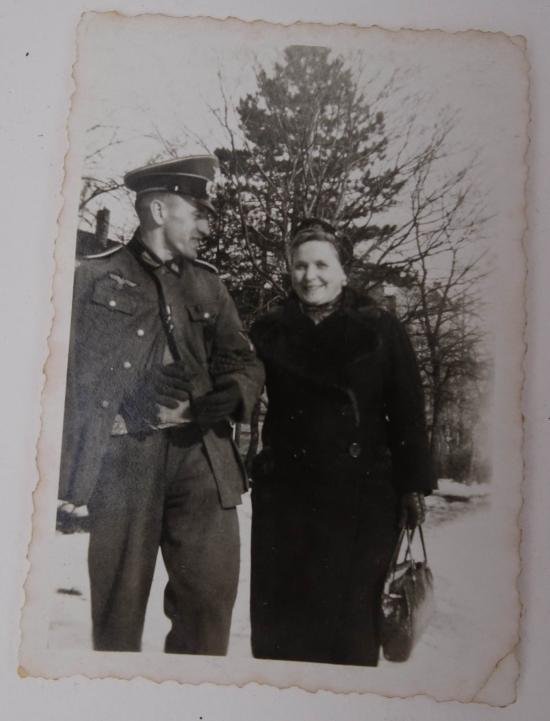 a nice picture of a German soldier and a woman — image 2