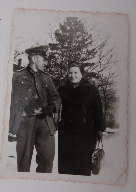 a nice picture of a German soldier and a woman — image 3