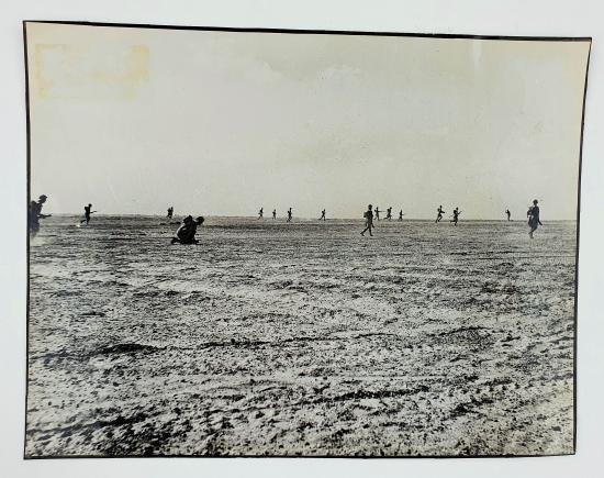 a british ww2 press picture off a group soldiers attacking — image 2
