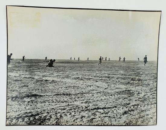 a british ww2 press picture off a group soldiers attacking — image 3