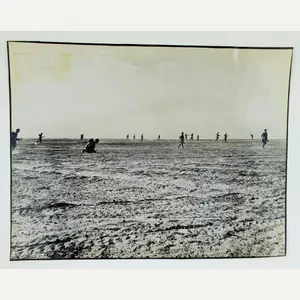 a british ww2 press picture off a group soldiers attacking