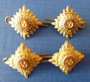 Army Lieutenant's Set of Four Brass /Gilding-metal Rank Pips.