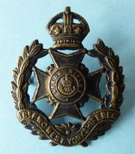 8th Bn., PWO West Yorkshire Regiment (Leeds Rifles) King's crown …
