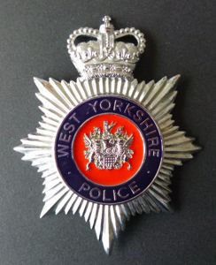 'West Yorkshire Police' Queen's crown Police Helmet-plate.