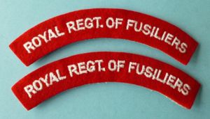 Pair of 'Royal Regt. of Fusiliers' Machine-embroidered Cloth Shoulder titles.