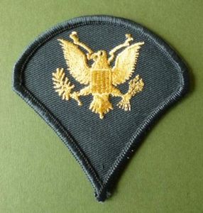 USA : Army Specialist 4th Grade (Sp.4) Armbadge.