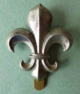 Manchester Regiment cap badge. White metal.