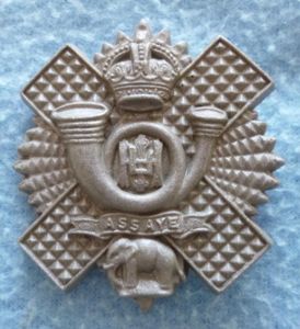 WW2 Highland Light Infantry Plastic War-economy Cap-badge.
