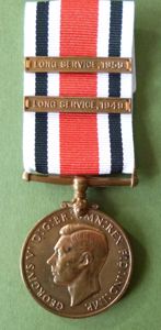 Special Constabulary Long Service Medal (GviR Ind.Imp) with two Long-service …