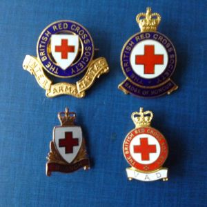 The British Red Cross Society Group of Four Enamelled Badges.