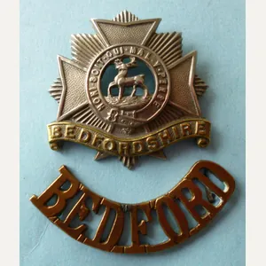 Bedfordshire Regimental Cap-badge with Brass 'Bedford' Shoulder-title.