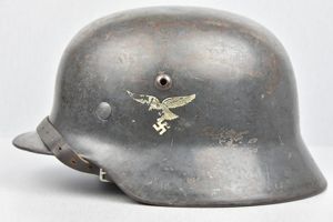 Early M35 Luftwaffe double decal steel helmet with droop tail …