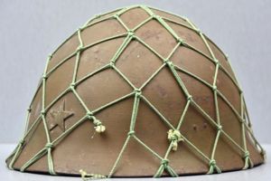 WW2 Type 90 Japanese army steel helmet with camouflage netting