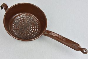 Post war reissued German gas mask filter into enameled colander …