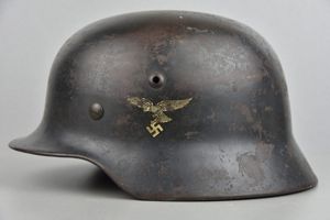 Early M35 Luftwaffe double decal steel helmet with droop tail …