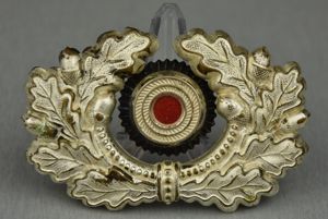 Early army visor cap cocarde in Buntmetall