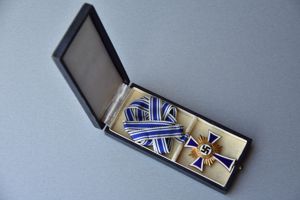 Mother's cross in gold with box by W. Pala Gablonz