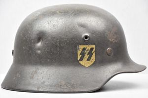 M40 Waffen-SS single decal steel helmet Q62 with bullet damages