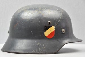 Early M35 Luftwaffe double decal steel helmet with droop tail …