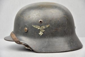 Early M35 Luftwaffe double decal steel helmet with droop tail …