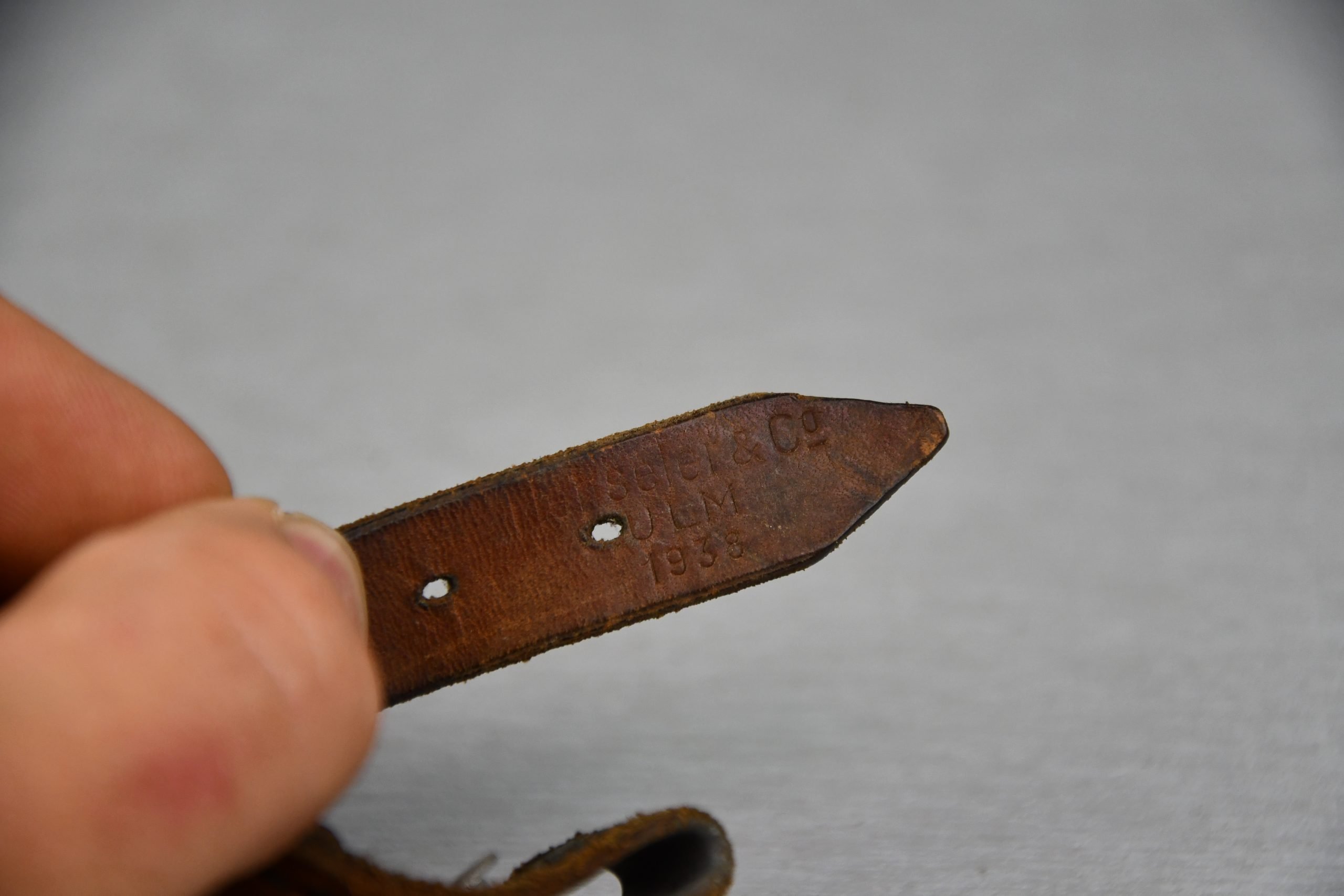 Early German helmet chin strap with aluminum buckle 1938 — image 4