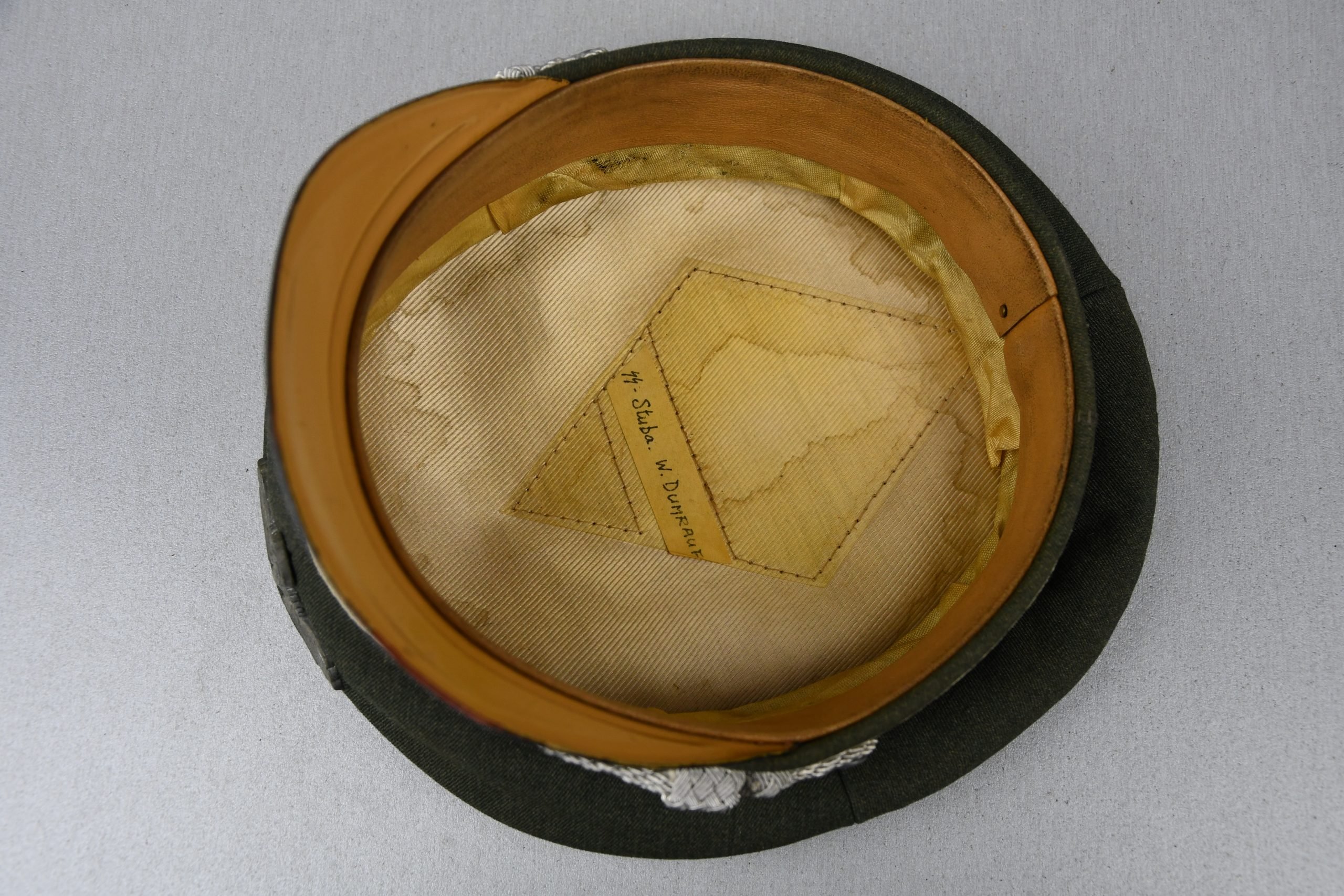 Waffen-SS 'Kleiderklasse' officer visor cap named — image 13
