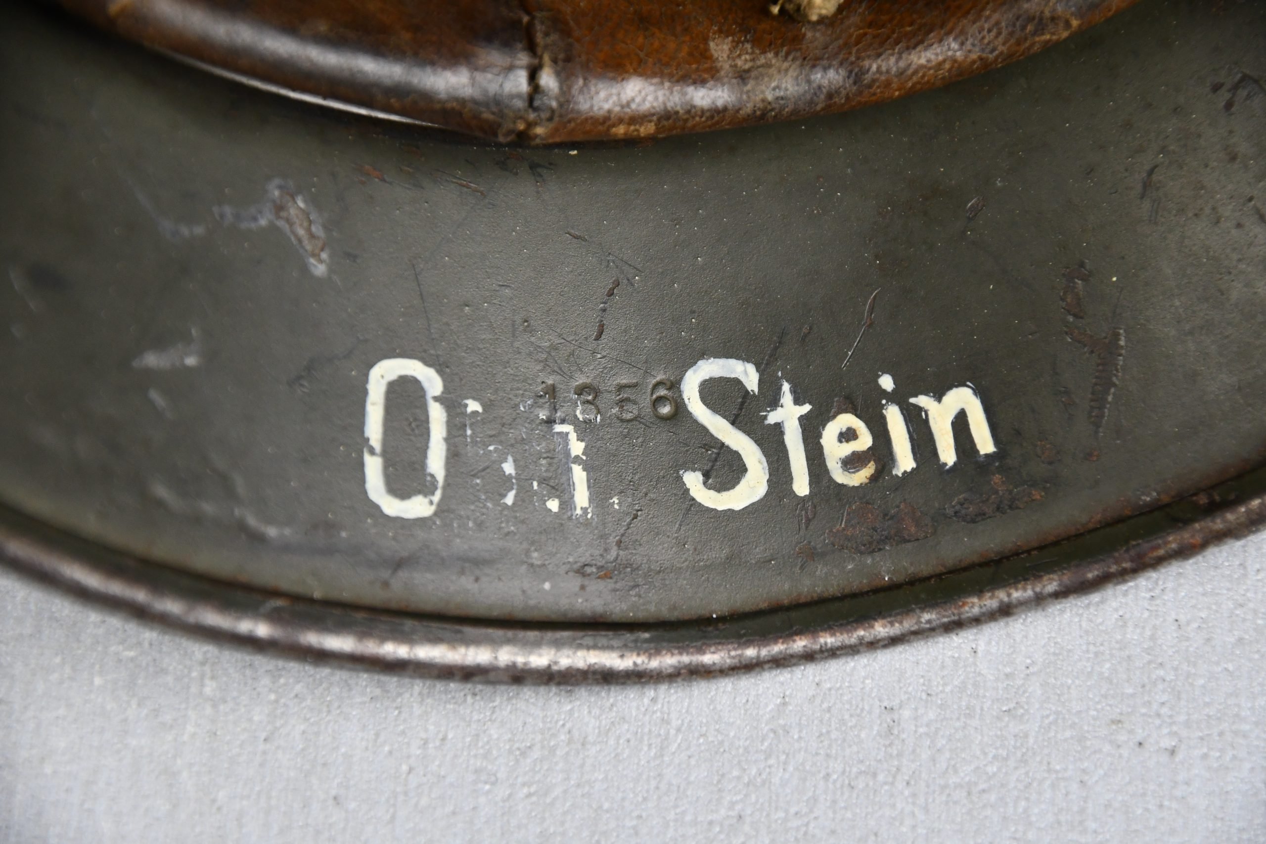 M35 army (Heer) structured camouflage helmet named to officer Oberleutnant Stein Q64 — image 10