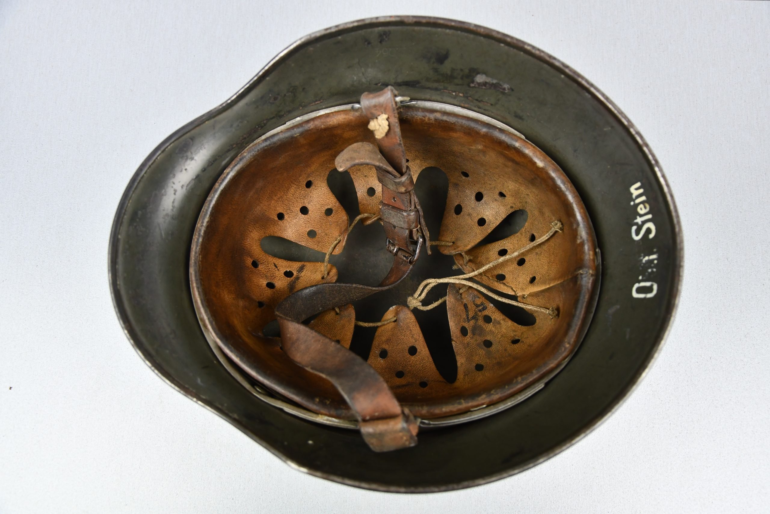 M35 army (Heer) structured camouflage helmet named to officer Oberleutnant Stein Q64 — image 7