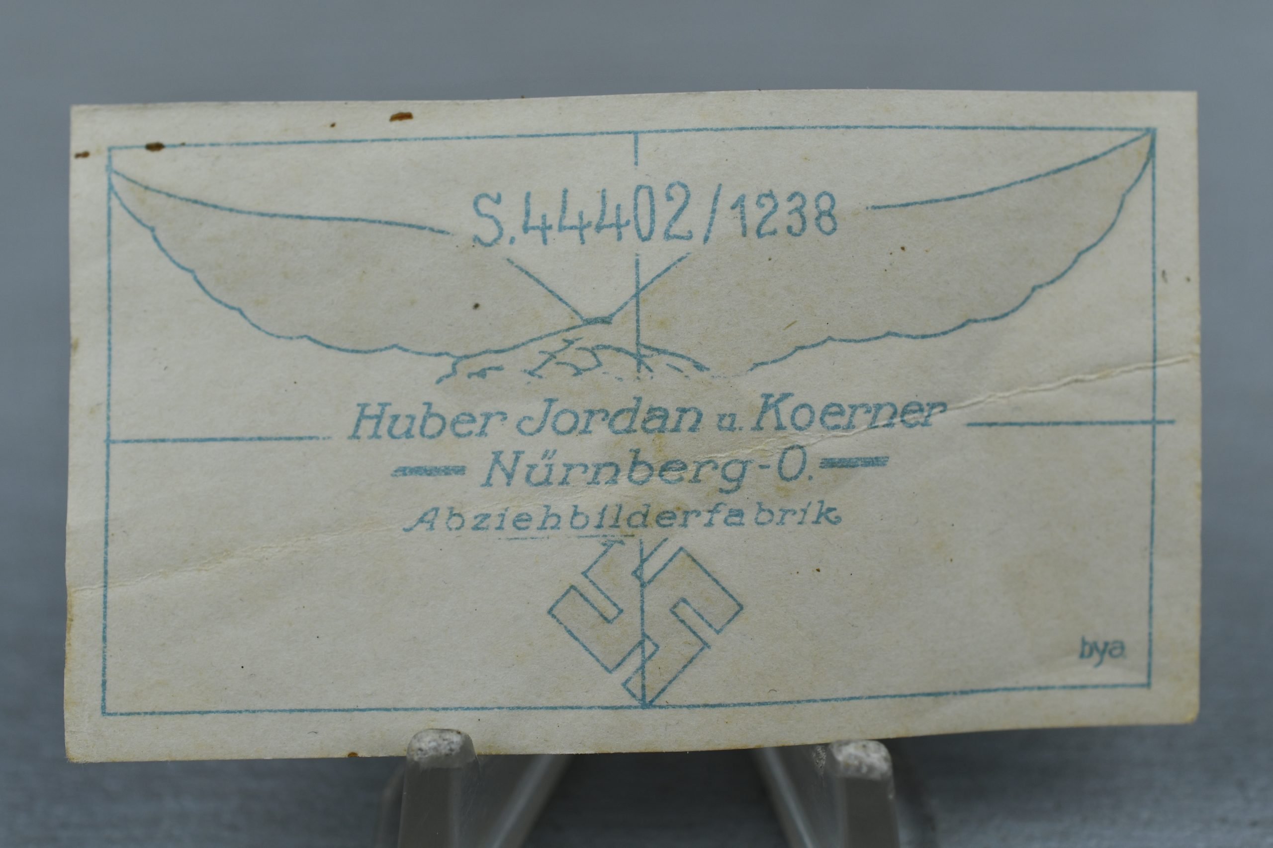 Unissued Luftwaffe helmet eagle decal by Huber Jordan u. Koerner — image 2
