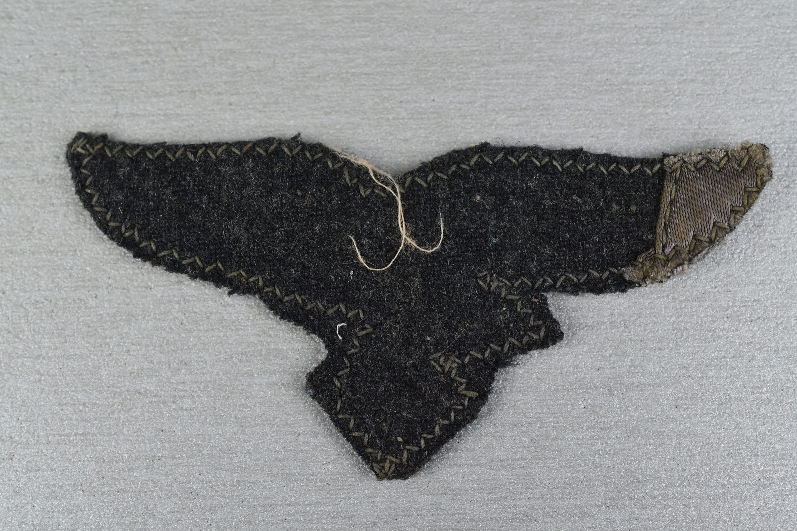 Uniform removed 'cut-off' Luftwaffe breast eagle — image 2