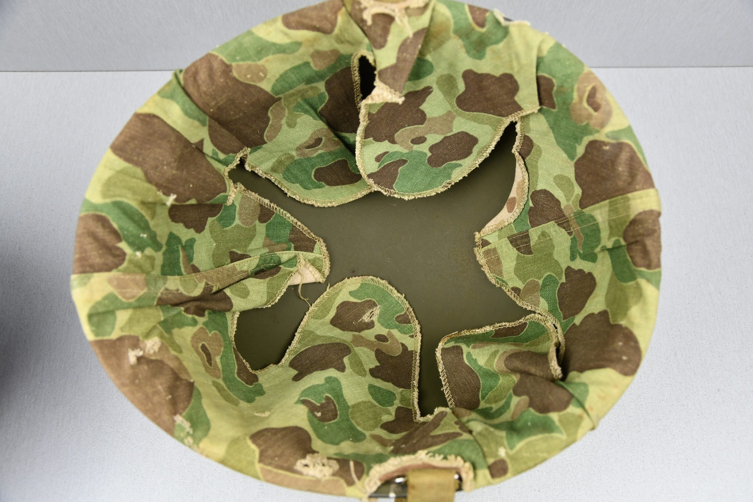 US WW2 M1 steel fixed bail helmet with liner by 'Int'l Molded Plastics Co' and USMC camo cover — image 15