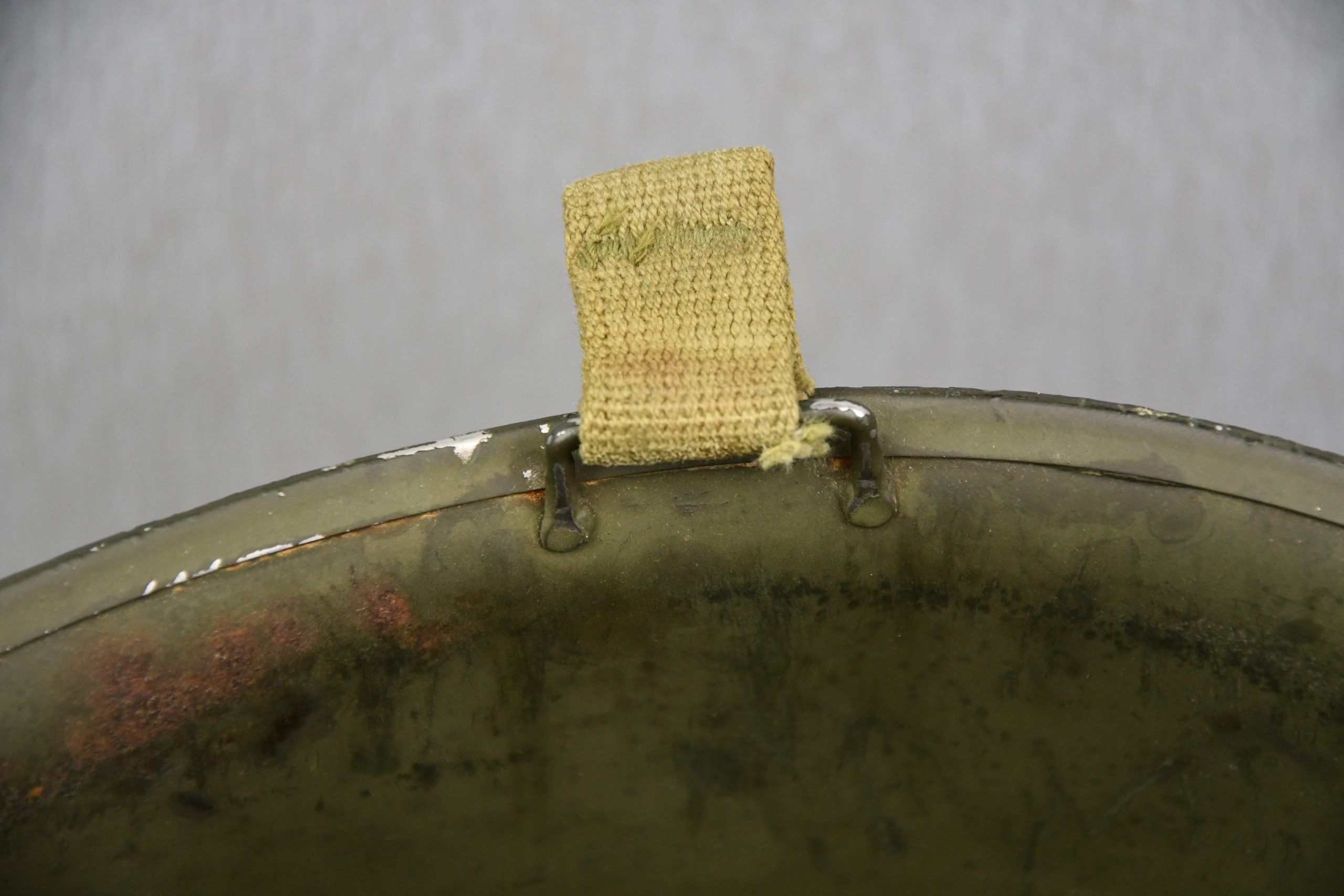 US WW2 M1 steel fixed bail helmet with liner by 'Int'l Molded Plastics Co' and USMC camo cover — image 17