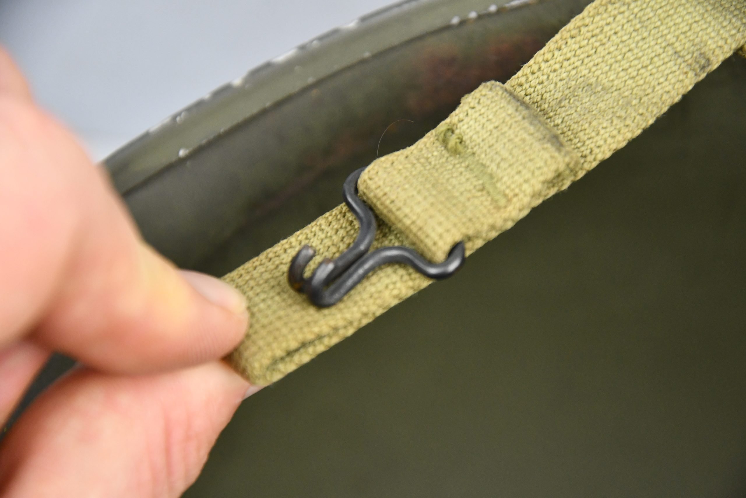 US WW2 M1 steel fixed bail helmet with liner by 'Int'l Molded Plastics Co' and USMC camo cover — image 18