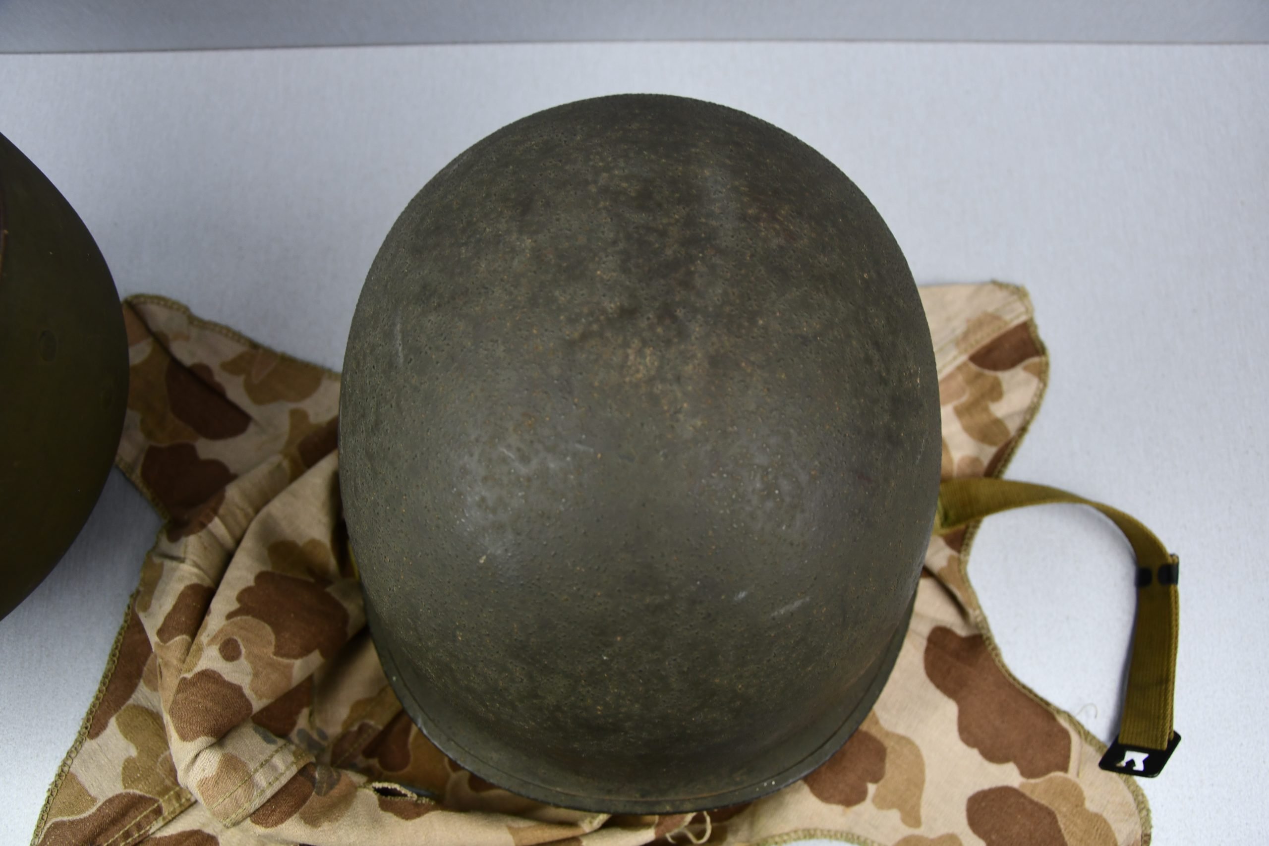 US WW2 M1 steel fixed bail helmet with liner by 'Int'l Molded Plastics Co' and USMC camo cover — image 26