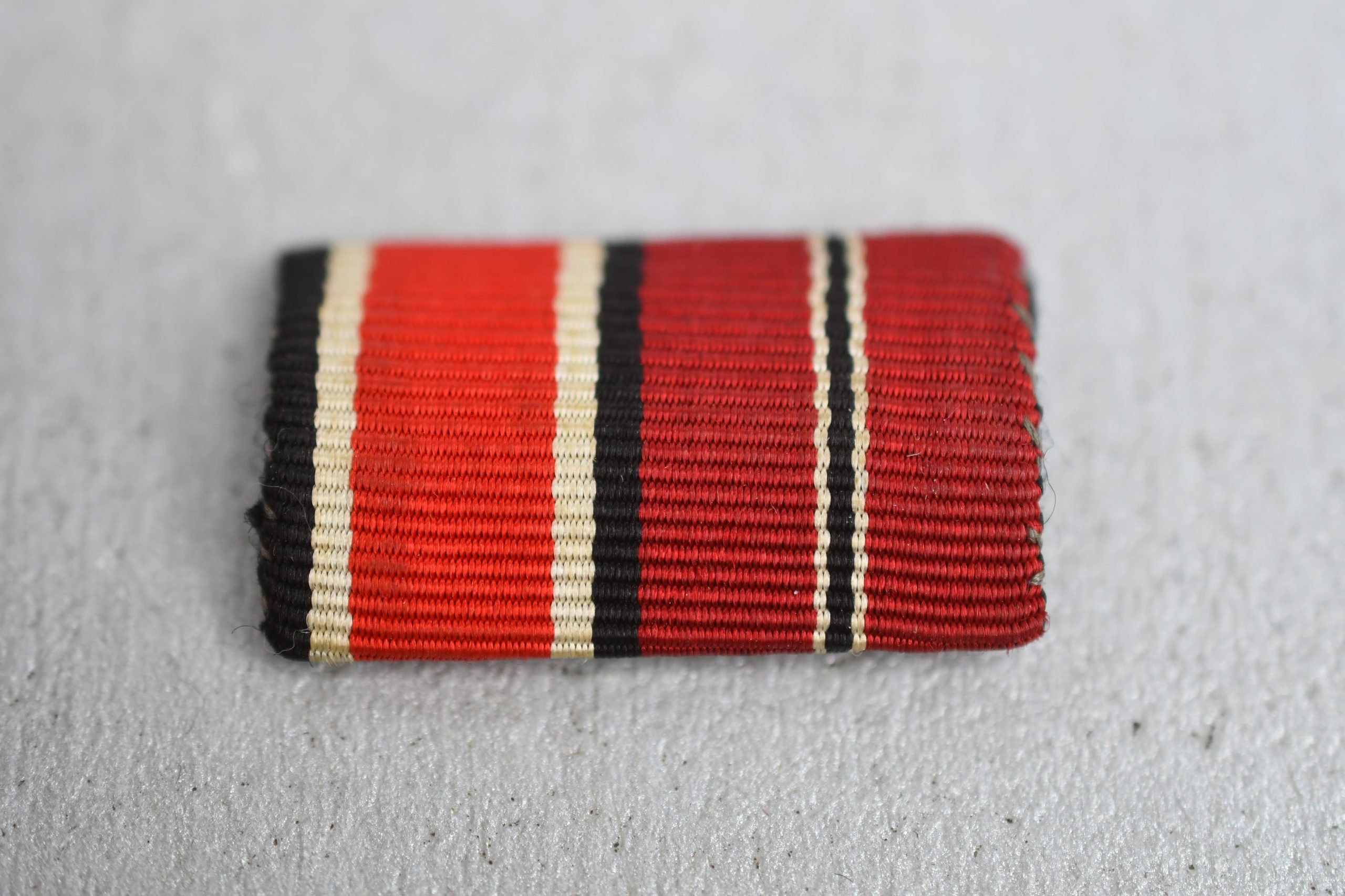 Two piece ribbon bar Iron Cross second class and Eastern Front Medal