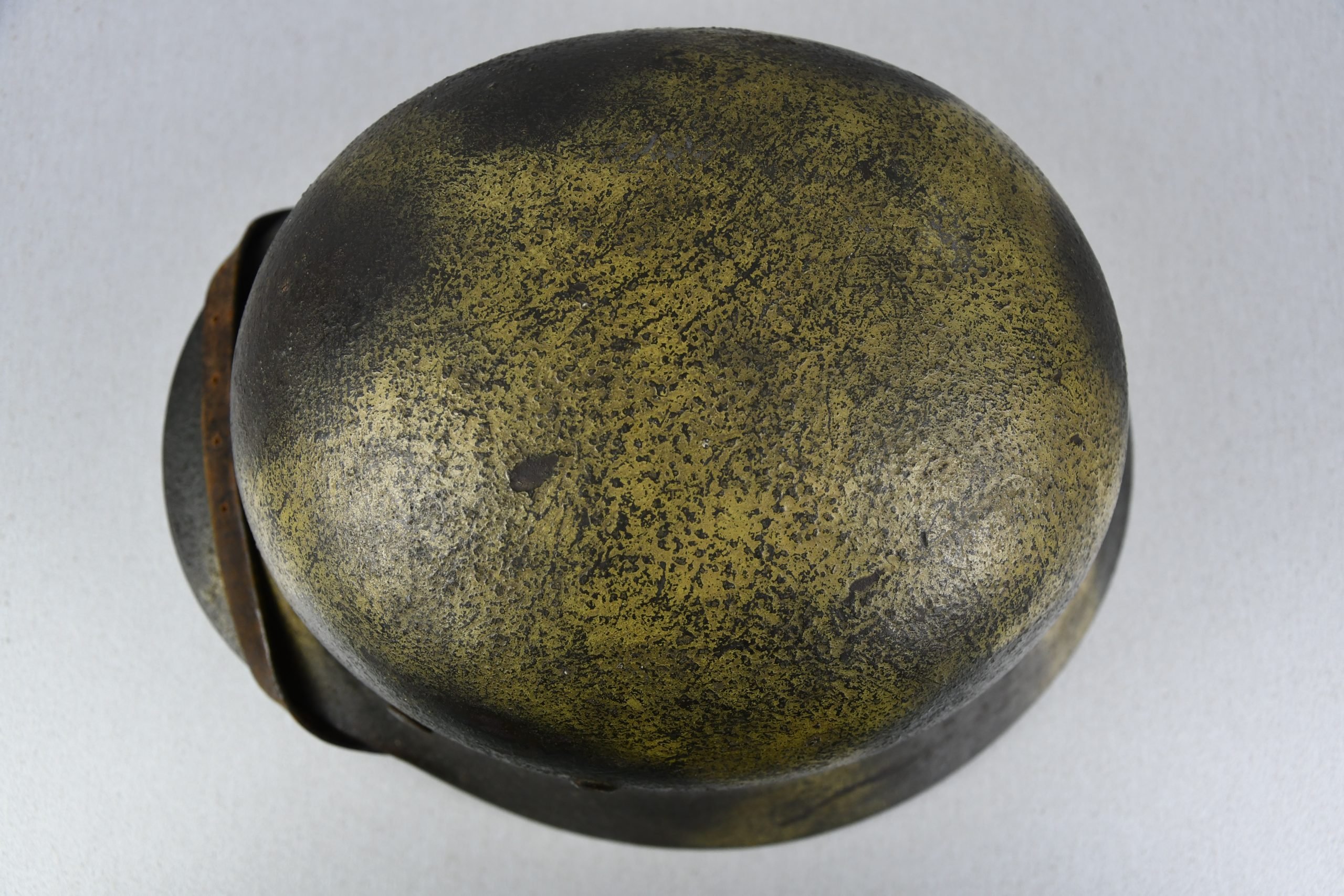 M35 army (Heer) reissued single decal camouflage steel helmet with bullet hit — image 11