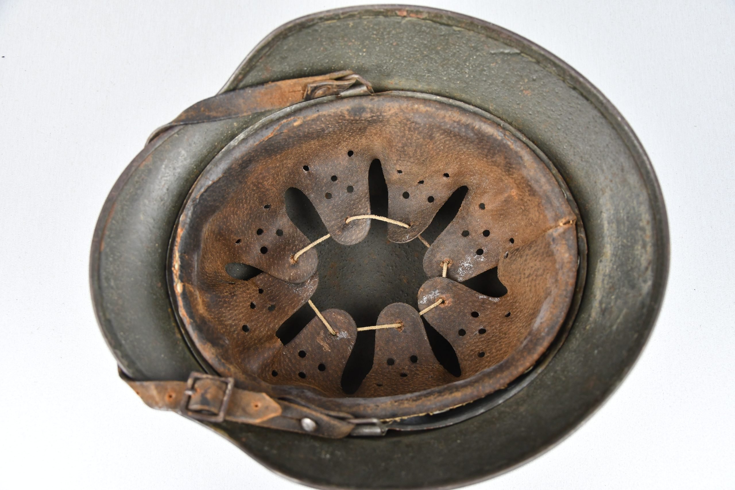 M35 army (Heer) reissued single decal camouflage steel helmet with bullet hit — image 12