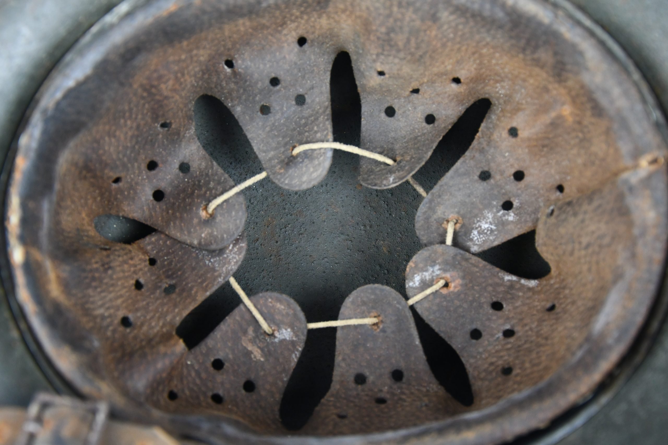 M35 army (Heer) reissued single decal camouflage steel helmet with bullet hit — image 13