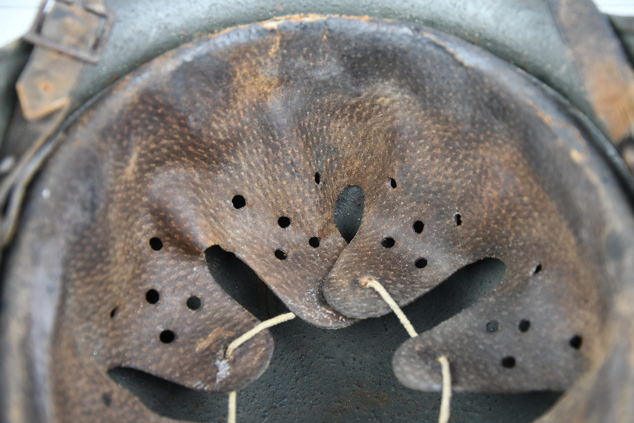 M35 army (Heer) reissued single decal camouflage steel helmet with bullet hit — image 14