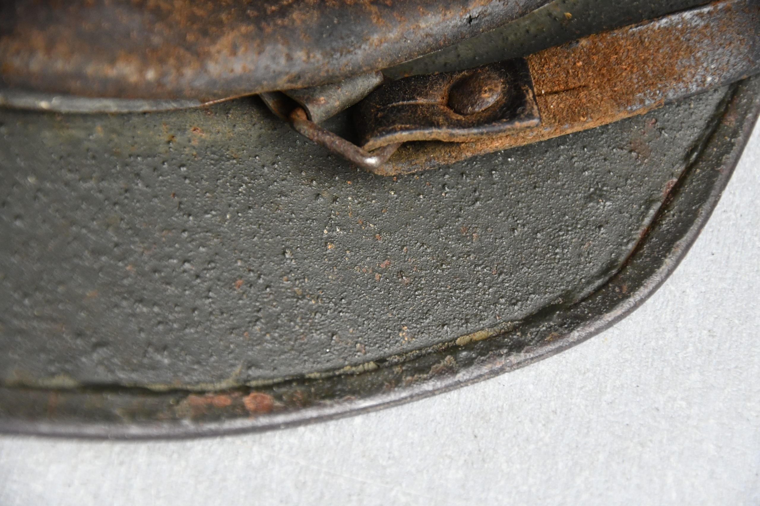 M35 army (Heer) reissued single decal camouflage steel helmet with bullet hit — image 16